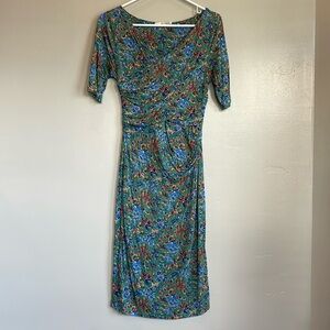 Boden ”Kelly” jersey, fitted wrap dress in floral green print. Size 6